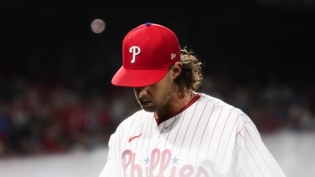 Oct 23, 2023; Philadelphia, PA, USA; Philadelphia Phillies starting pitcher Aaron Nola (27) walks off the mound during the fifth inning against the Arizona Diamondbacks in game six of the NLCS at Citizens Bank Park. Mandatory Credit: Joe Rondone-Arizona Republic